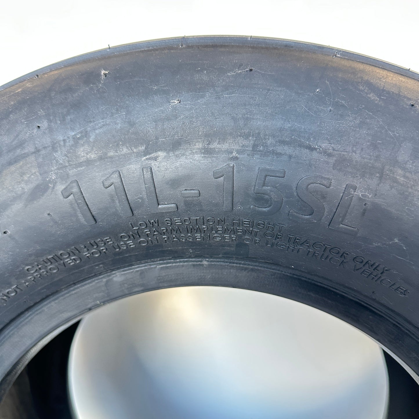 FARM SPECIALIST 11L-15SL Tire 39 lbs. Sz 26 in x 9.5 in. Black