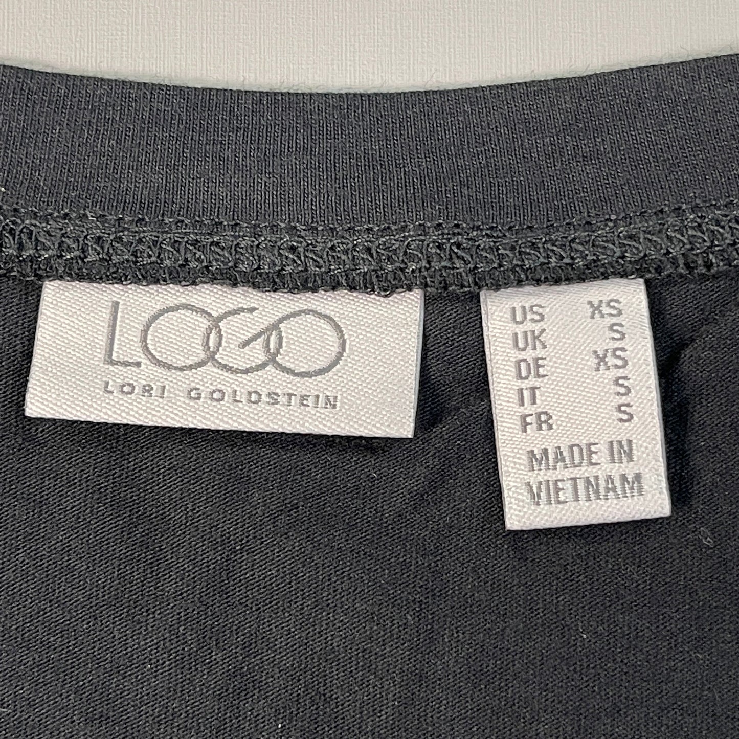 LOGO LORI GOLDSTEIN Knit Short Sleeve Shirt Asymmetric Hem Women's Sz XS Black (New)
