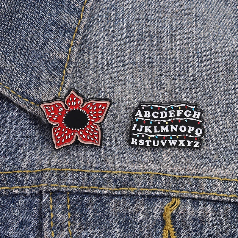 Sci-fi Horror Movies Brooch Enamel Pins Red Cannibal Flowers And 26 English Letter Brooches Backpack Lapel Badge Jewelry Gifts