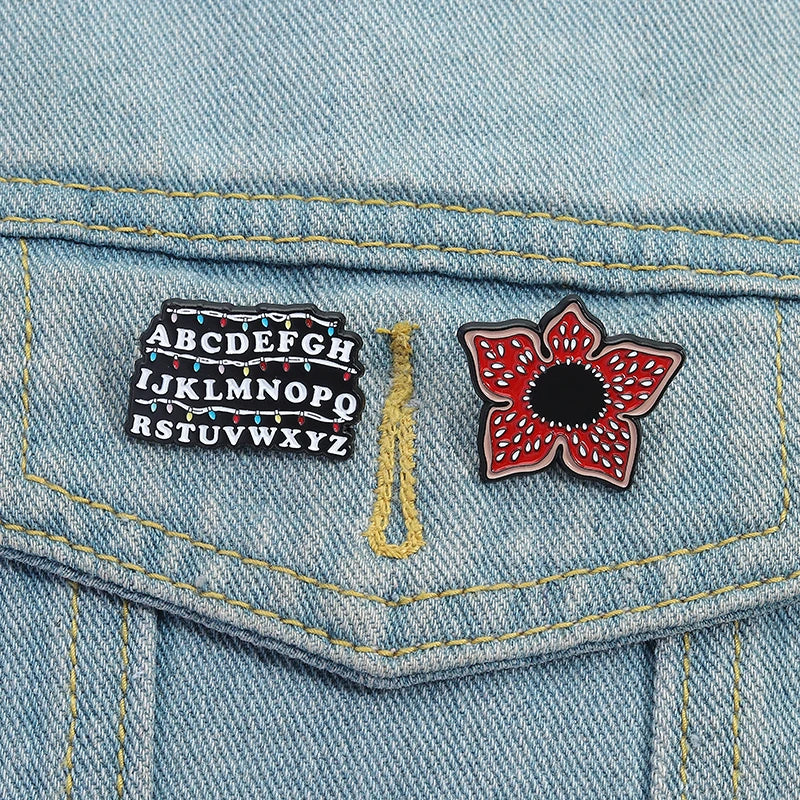 Sci-fi Horror Movies Brooch Enamel Pins Red Cannibal Flowers And 26 English Letter Brooches Backpack Lapel Badge Jewelry Gifts