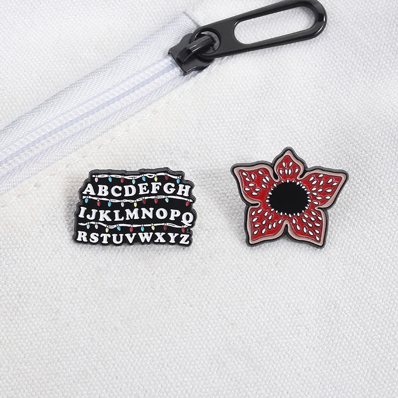 Sci-fi Horror Movies Brooch Enamel Pins Red Cannibal Flowers And 26 English Letter Brooches Backpack Lapel Badge Jewelry Gifts