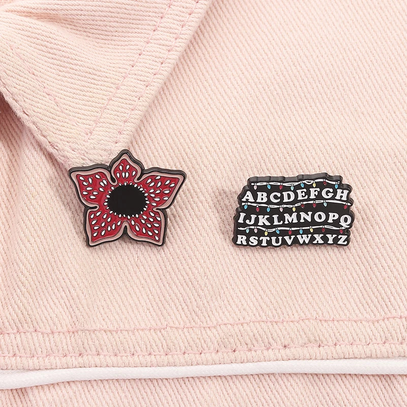 Sci-fi Horror Movies Brooch Enamel Pins Red Cannibal Flowers And 26 English Letter Brooches Backpack Lapel Badge Jewelry Gifts